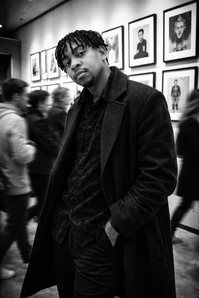 High-contrast black and white cinematic gallery portrait with motion blur, generated using ChatGPT on the free tier, from an AI image prompt by Victor Ijomah